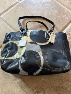 Coach Black Leather Tote with Beige and Gray Circle Accents